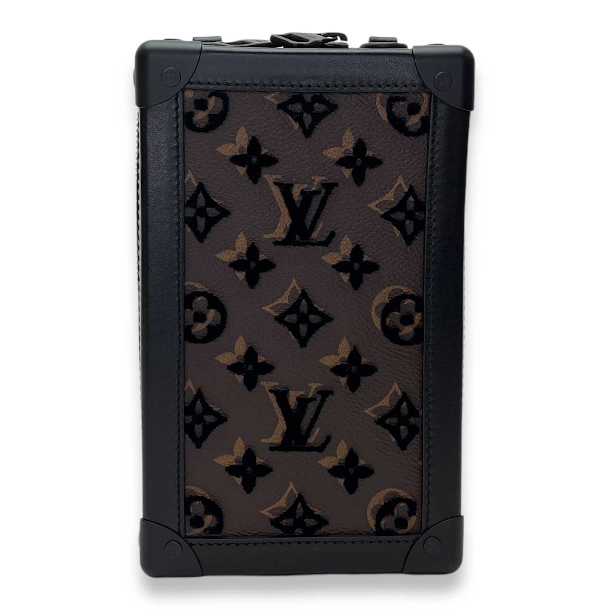 Vertical Soft Trunk Crossbody bag in Monogram Coated Canvas, Lacquered Metal Hardware