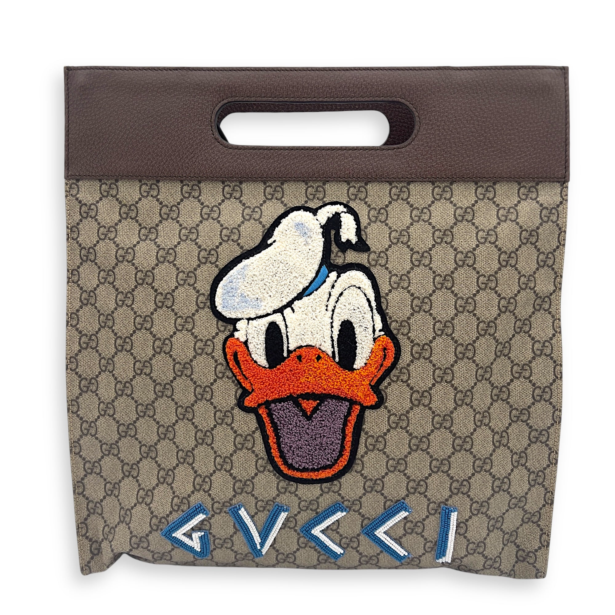 X Disney Donald Duck Soft GG Supreme Brown Top Handle Bag in Monogram Coated Canvas, Gold hardware